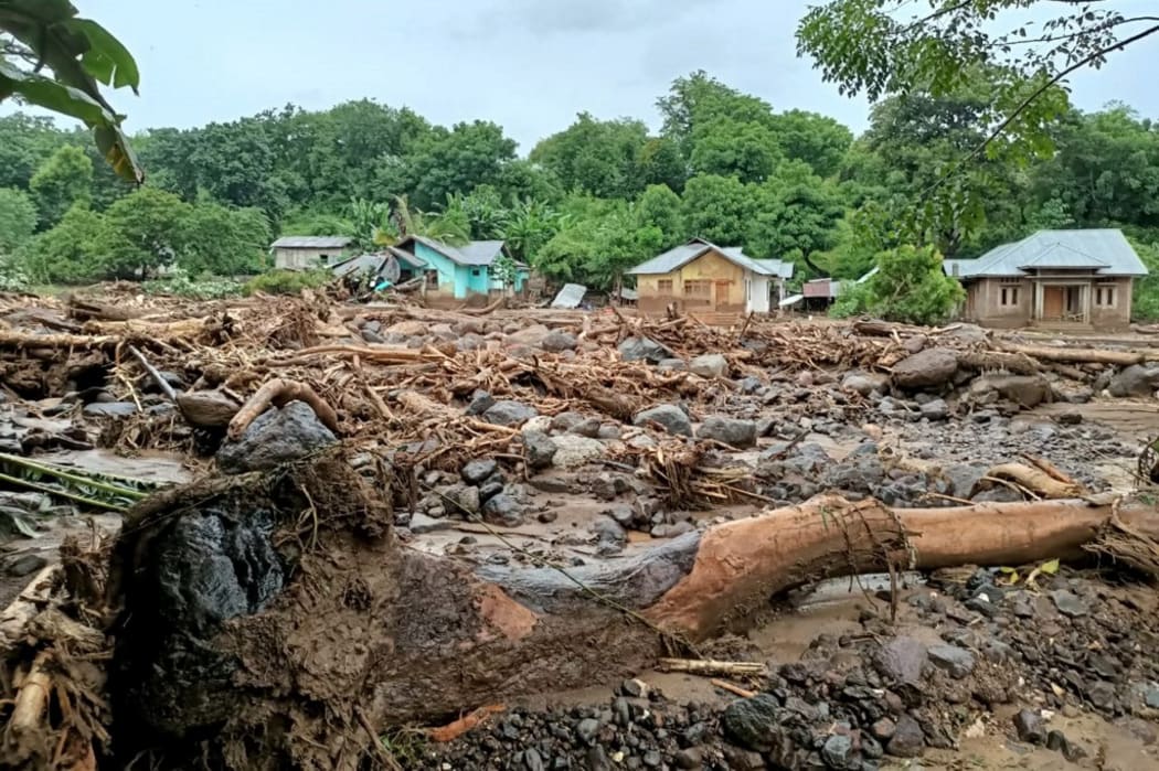 This general view shows debris left behind in the town of Adonara in East Flores on April 4, 2021, after flash floods and landslides swept eastern Indonesia and neighbouring East Timor.