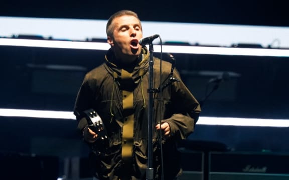 Liam Gallagher, lead singer of British rock band Oasis performs on stage at the Principality Stadium in Cardiff on July 4, 2025.