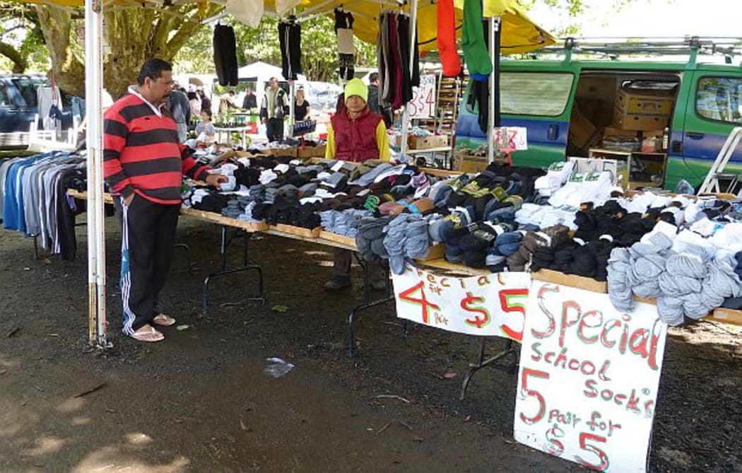 Socks pilled up on long trestle at stall at Auckland's Avondale Market