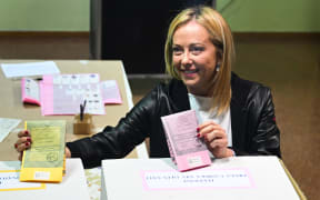 Giorgia Meloni, leader of Italian far-right party Fratelli d'Italia (Brothers of Italy), casts her vote on 25 September, 2022, in Rome.