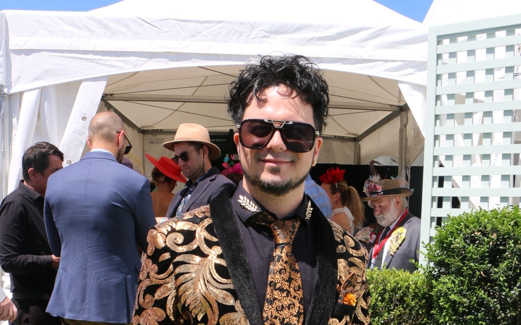 Dallas Williams entered the Cup Day Fashion competition, sporting a gold sequined and black velvet suit
