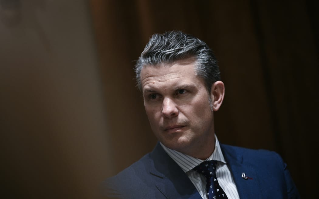 (FILES) US Defense Secretary Pete Hegseth looks on before a luncheon with Italian Prime Minister Giorgia Meloni in the Cabinet Room of the White House, in Washington, DC, on April 17, 2025. US Defense Secretary Pete Hegseth shared information on forthcoming US air strikes on Yemen in a private Signal chat group that included his wife, brother and personal lawyer, the New York Times reported on April 20.
AFP was not able to independently verify the Times' report, which detailed what would be the second time Hegseth has been accused of sharing sensitive military information on the commercial messaging app with unauthorized personnel. (Photo by Brendan SMIALOWSKI / AFP)