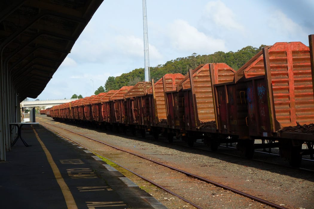 Rustry disused log train cars lined up at the Whangarei rail yards