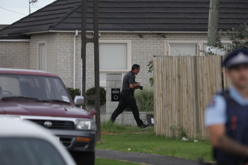 A cordon in Papatoetoe after a man was shot by police.