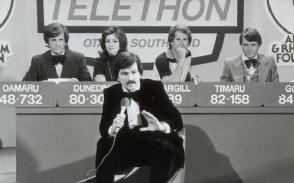 Neil Collins (front) fronting the Otago Southland studio component of the 1978 Telethon.