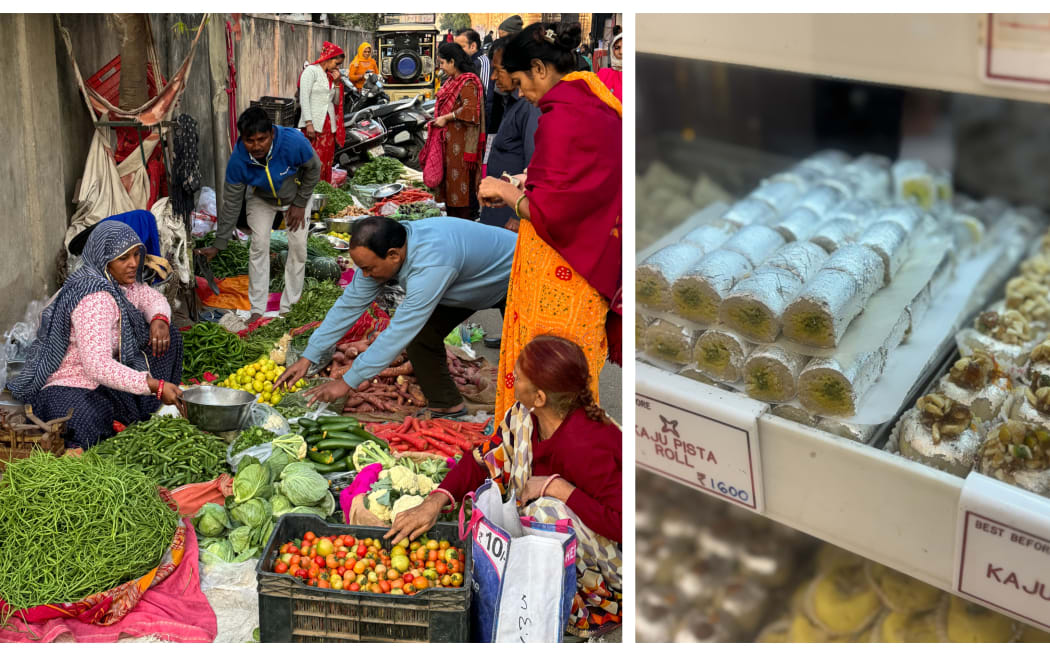 Vibrantly coloured street market in India with sari wearing women selling vegetables