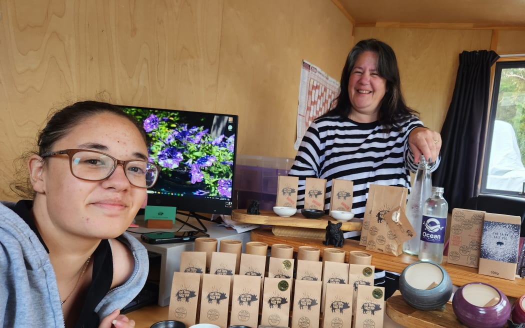 Devyn Whitford and her mother Stephanie Nash in The Taipa Salt Pig production room with flavoured salt ready for tasting