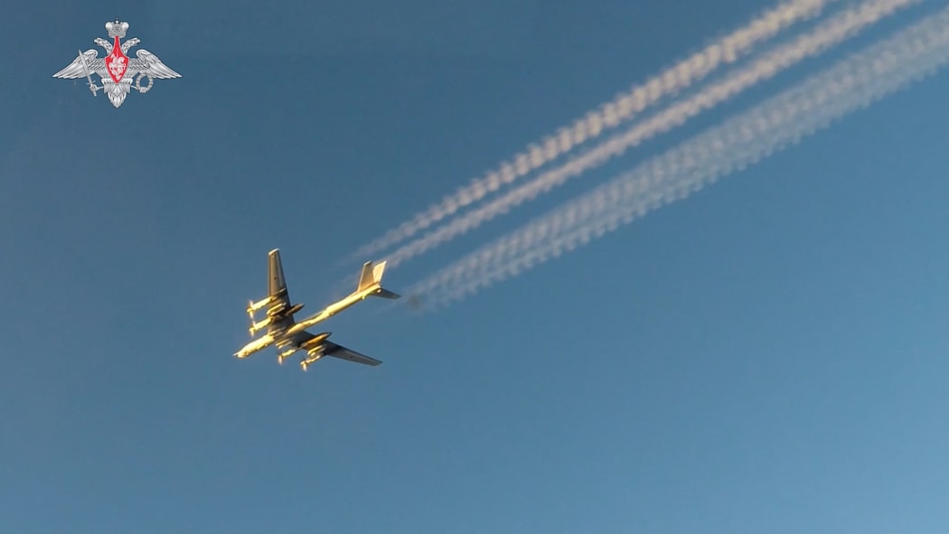 This handout video grab released by the Russian Defence Ministry on February 19, 2022, shows a Russian Tu-95MS bomber aircraft flying during the Grom-2022 Strategic Deterrence Force exercise at an undefined location in Russia.