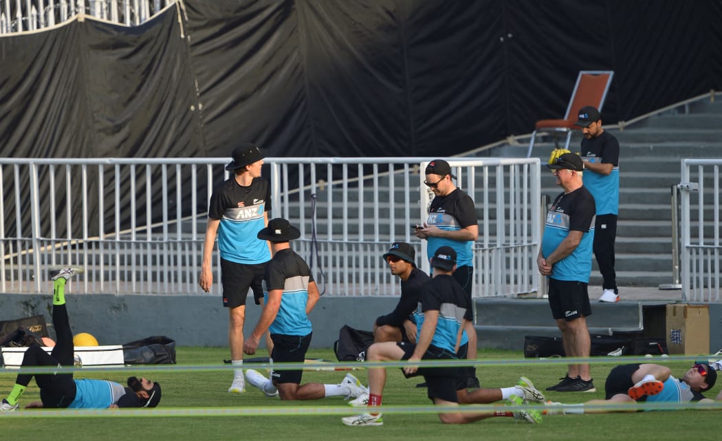 New Zealand's cricketers warm up during a practice session at the Rawalpindi Cricket Stadium in Rawalpindi on September 14, 2021, ahead of their first one-day international (ODI) cricket match against Pakistan. (Photo by Farooq NAEEM / AFP)