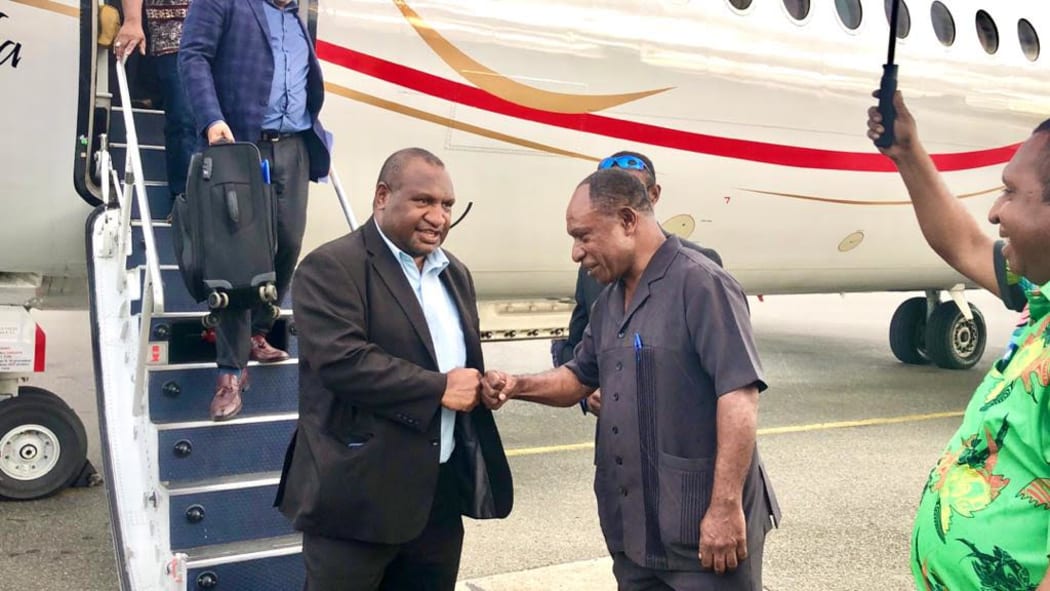 PNG prime minister James Marape (left) arrives in Morobe Province, greeted by Morobe Governor, Ginson Saonu.
