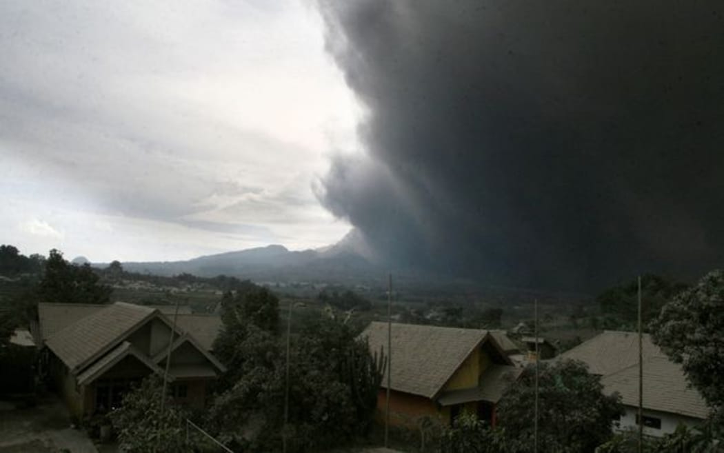 Part of the plume of hot ash from Mount Kelud volcano in east Java.