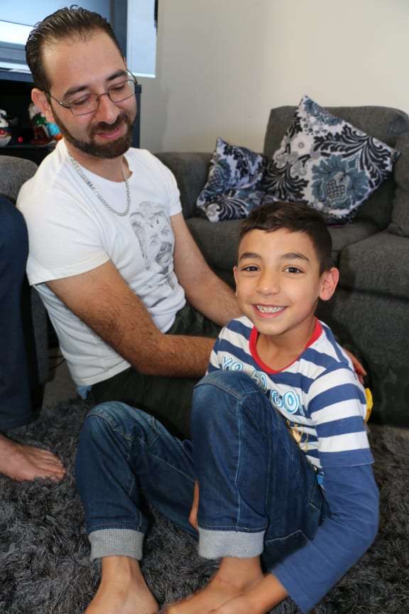 Mohi Aldin Alakkad with his family at home in Wellington