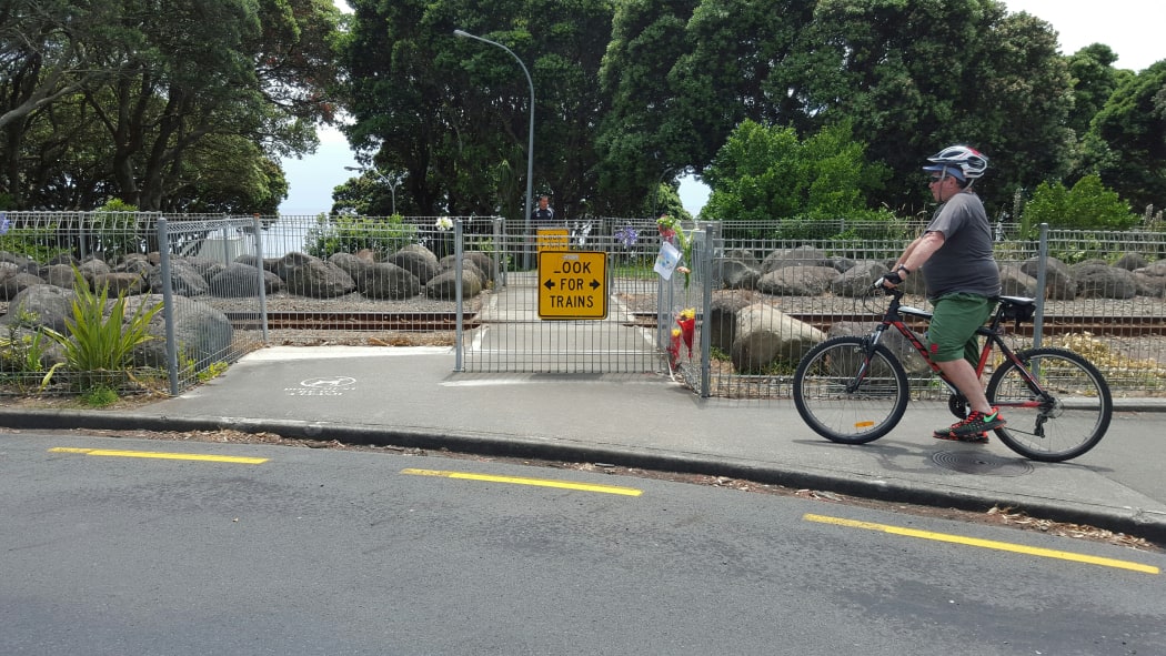 A cyclist approaches the rail crossing  where Matthew Meijer died.