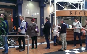 Voters wait at Wellington City Council offices on Saturday.