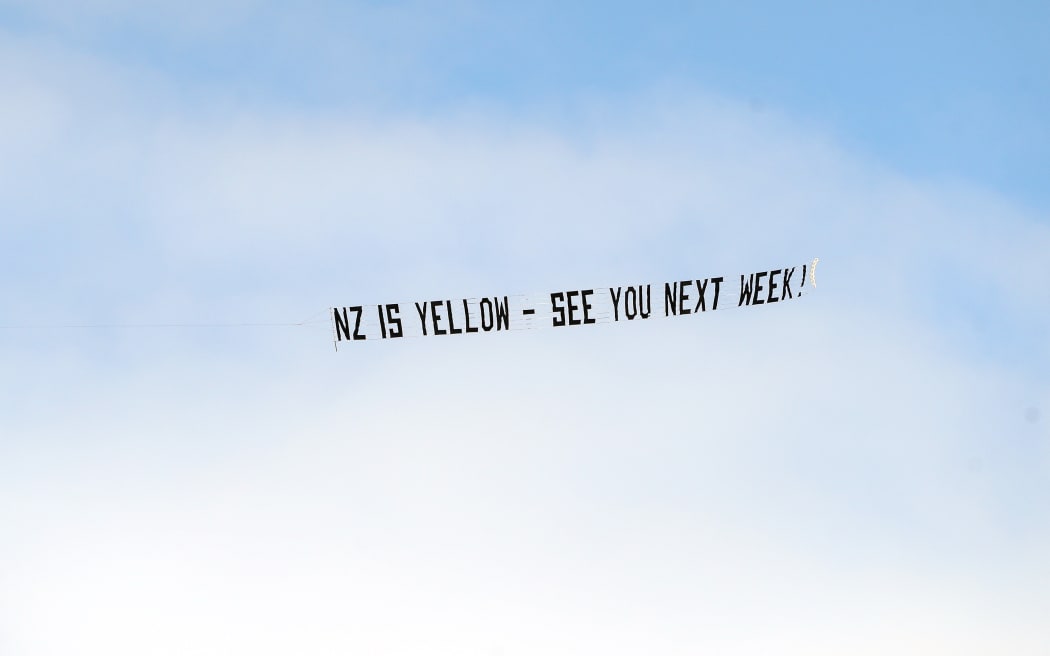 Wellington Phoenix making their presence felt with a banner over an Auckland FC game.
