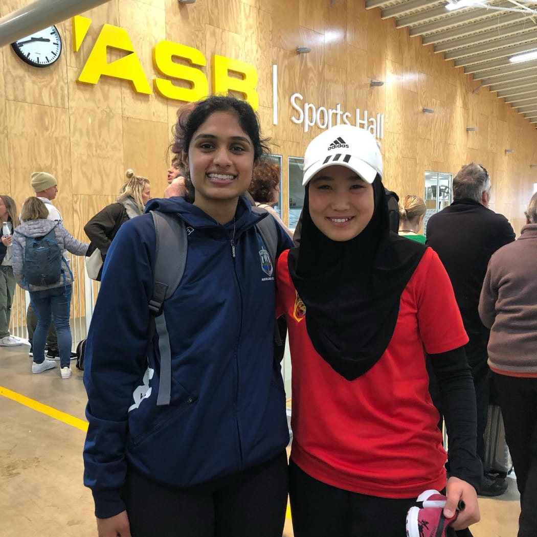 Fatima Hussaini (right) with friend Shive at a futsal tournament earlier this year.