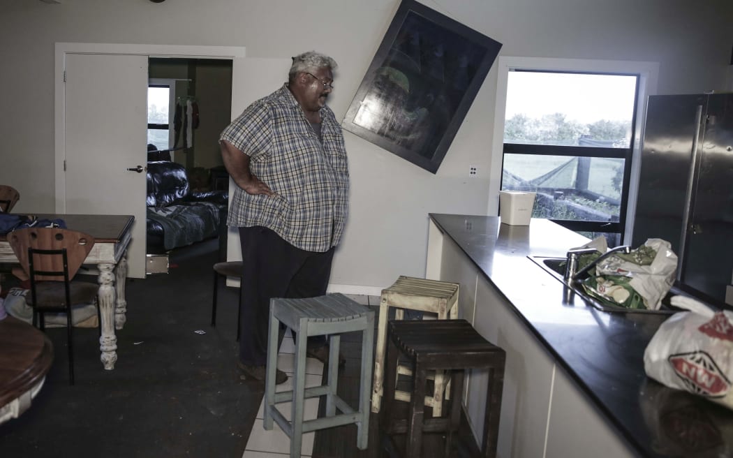 Mark Solomon in his wrecked home near Kaikoura