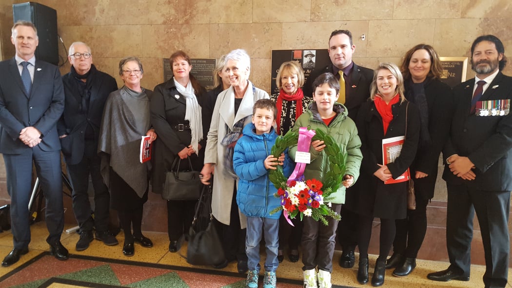The family of Leslie Andrew attend the ceremony, where his great grandsons who laid a wreath.