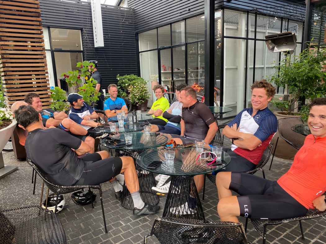 A group of cyclists happily settling in at Ortolana in Britomart.