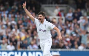 Josh Tongue of England celebrates