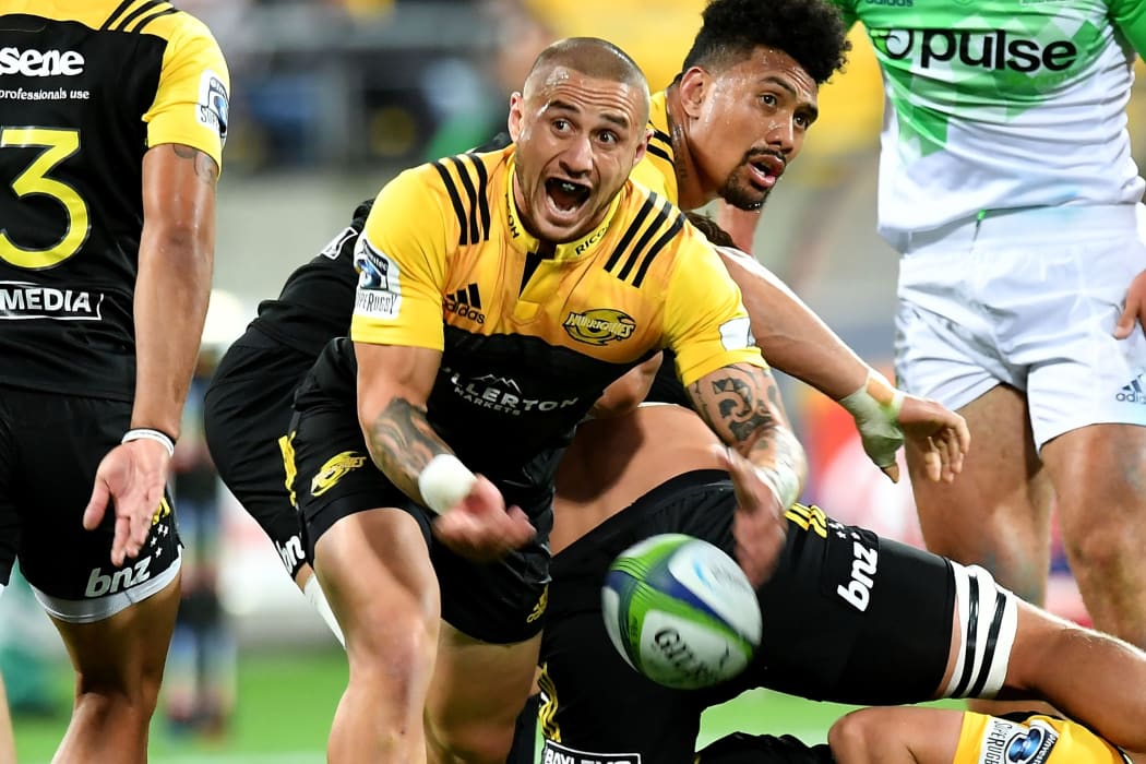 Hurricanes' TJ Perenara makes a pass during the Hurricanes vs Highlanders Super Rugby match at Westpac Stadium in Wellington on Saturday the 18 March 2017.