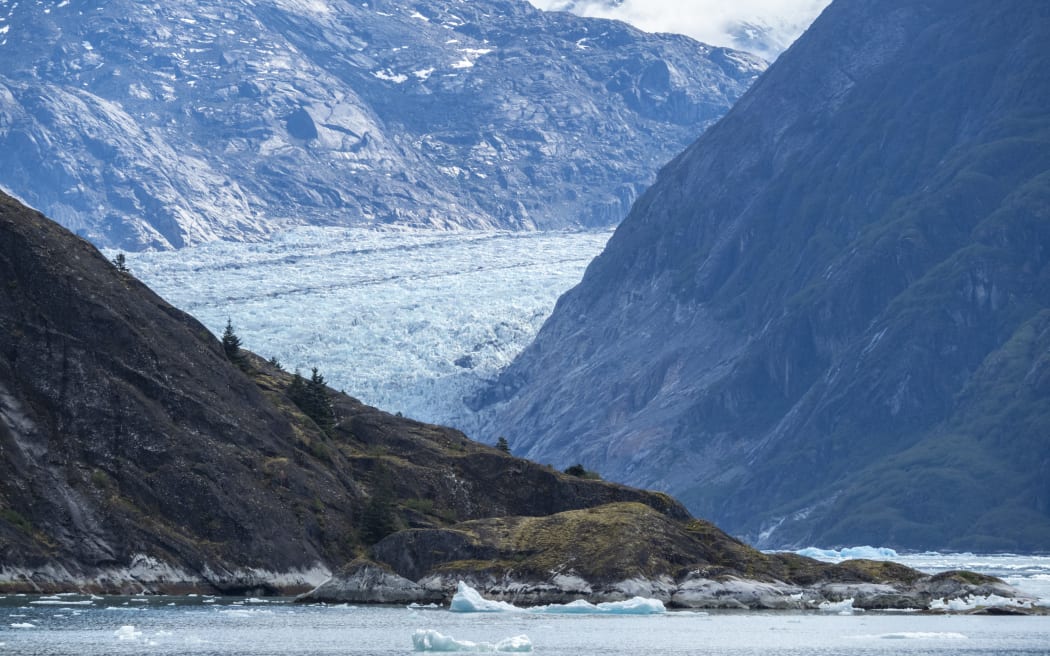 Retreating tidewater South Sawyer Glacier meets the rock, Tracy Arm, Southeast Alaska, United States of America, North America (Photo by Michael Nolan / Robert Harding RF / robertharding via AFP)