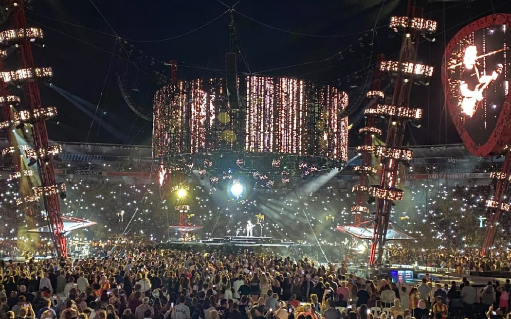 A large crowd watches Ed Sheeran in Wellington.