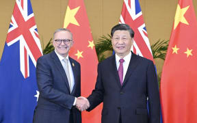 Australian Prime Minister Anthony Albanese, left, meets with Chinese President Xi Jinping in Bali, Indonesia, November 15, 2022. (Photo by Yan Yan / XINHUA / Xinhua via AFP)