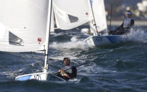 New Zealand's Sam Meech competes in the Laser Men sailing class on Guanabara Bay in Rio de Janerio during the Rio 2016 Olympic Games on August 13, 2016.