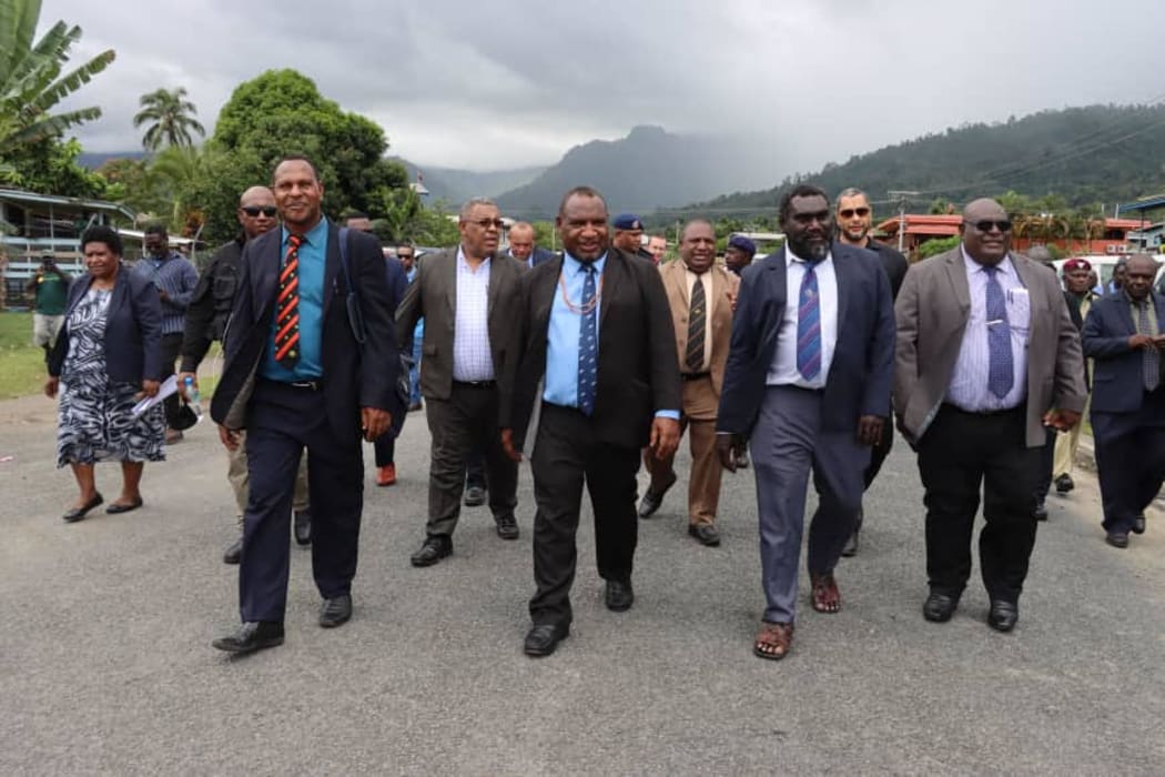 PNG Prime Minister James Marape (centre) arrives in Arawa for talks with Bougainville's President Ishmael Toroama (second from right) 5 February, 2021
