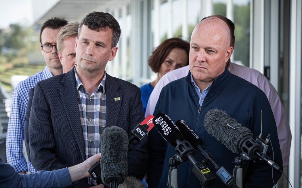 David Seymour, Christopher Luxon and other coalition MPs speak to media at Field Days in Feilding on 14 March 2024.