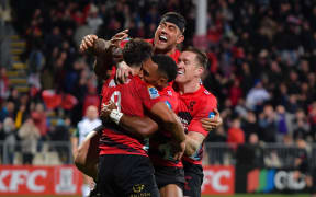Noah Hotham celebrates his try with Codie Taylor,  Sevu Reece and Dallas McLeod of the Crusaders during the Super Rugby Pacific match, Crusaders Vs Blues, at the Apollo Projects Stadium in Christchurch.