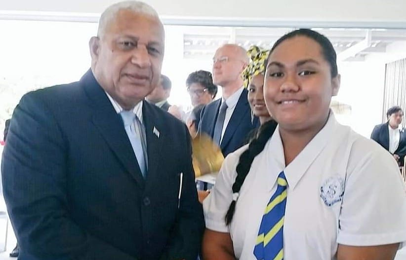 AnnMary Raduva with Prime Minister Frank Bainimarama.
