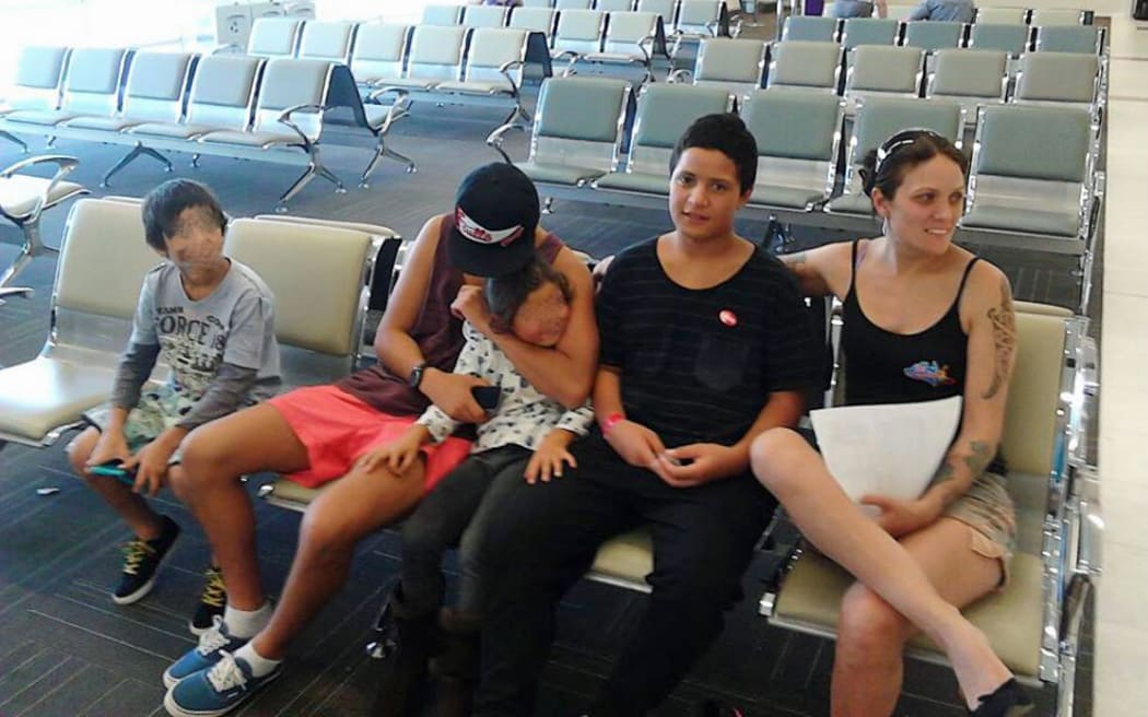 Kylee Douglas (r) and her family.