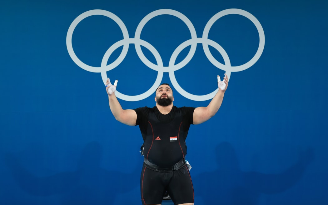 Man Asaad (SYR) competes in the Weightlifting at the 2024 Paris Olympics.