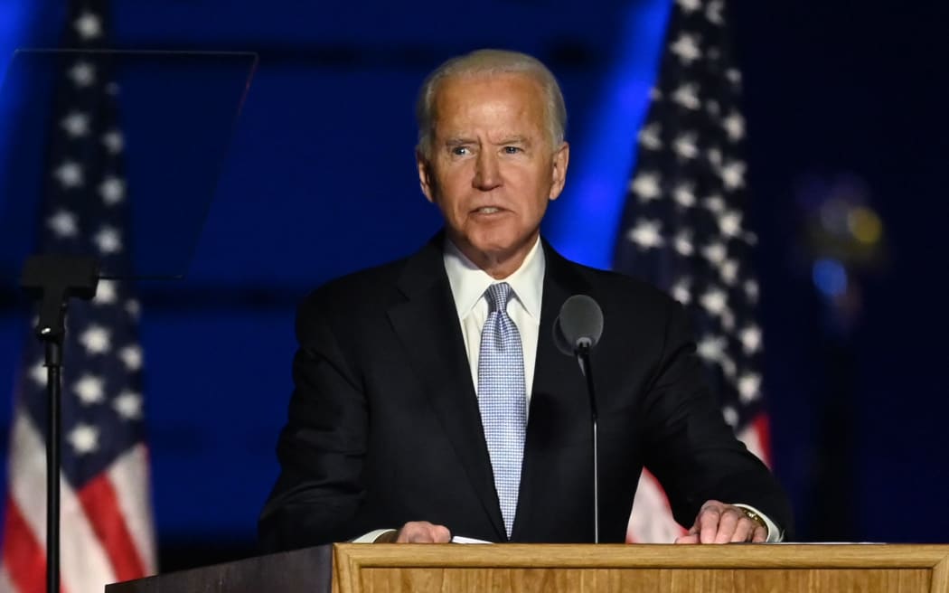 US President-elect Joe Biden delivers remarks in Wilmington, Delaware, on November 7, 2020, after being declared the winner of the presidential election. (Photo by Jim WATSON / AFP)