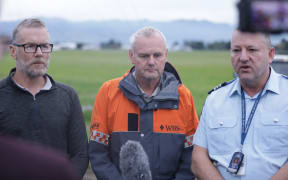 From left: Darren Myers' brother-in-law Duncan Styles, Murray Johnson from LandSAR, and Sergeant Tony Matheson