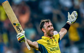 Australia's Glenn Maxwell celebrates after hitting the winning runs against Afghanistan at the Cricket World Cup.