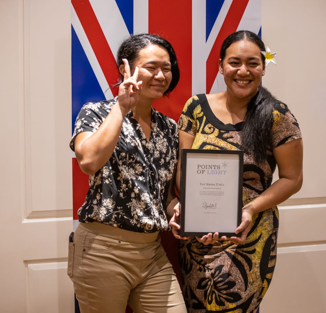 Jun Ho Gregory Kim  and  Fusi Masina Tietie who won the Commonwealth Point of Light award