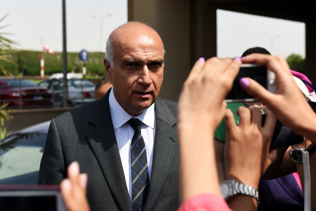 Newly-appointed Egyptian Tourism Minister Khaled Ramy arrives to Dar al-Fouad Hospital in a western Cairo suburb ahead of a visit to the injured tourists.