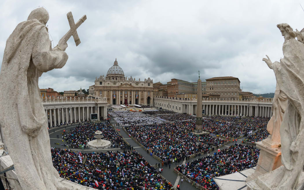 Part of the audience at the canonisation of Popes John XXIII and John Paul II in St Peter's Square at the Vatican.