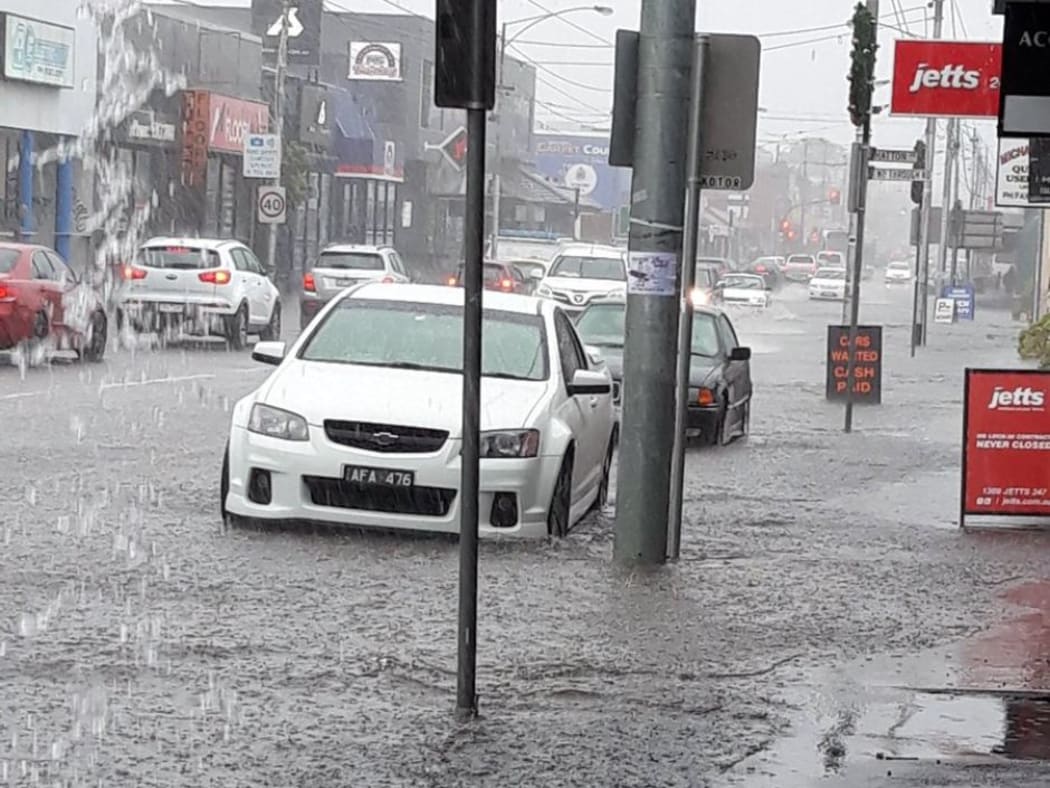 Flash flooding hit Sydney Road in Melbourne on Friday afternoon.