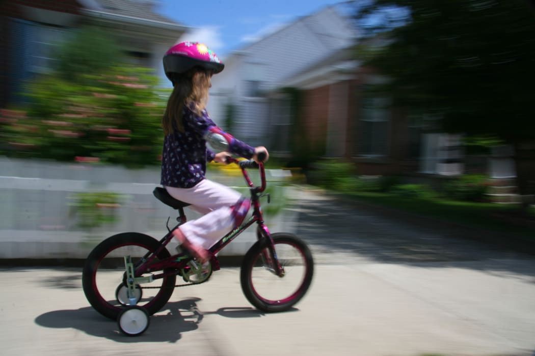 Kid on bike