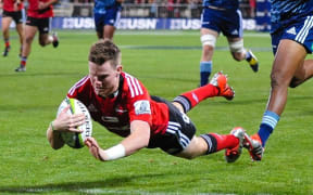 The Crusaders' Mitchell Drummond scores a try against the Blues, 25 April 2015 at AMI Stadium, Christchurch. Copyright Photo: John Davidson / www.Photosport.co.nz
