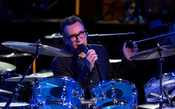 Fred Armisen behind a drum kit