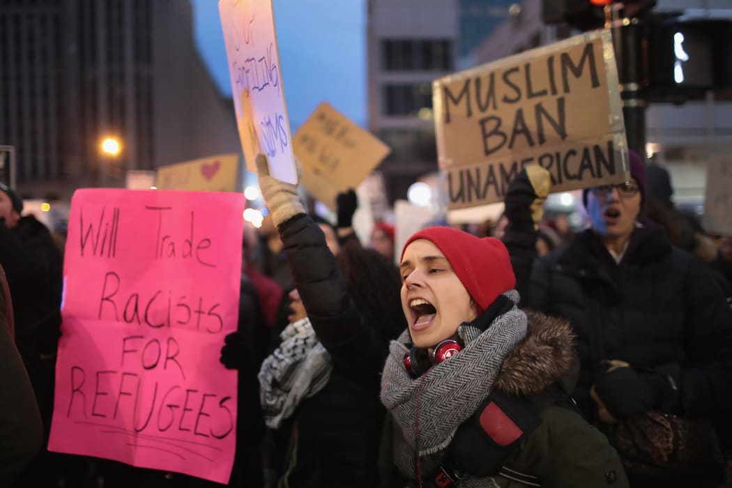 Several hundred demonstrators protest President Donald Trump's executive order which imposes a freeze on admitting refugees into the United States and a ban on travel from seven Muslim-majority countries at the international terminal at O'Hare Airport on February 1, 2017 in Chicago, Illinois