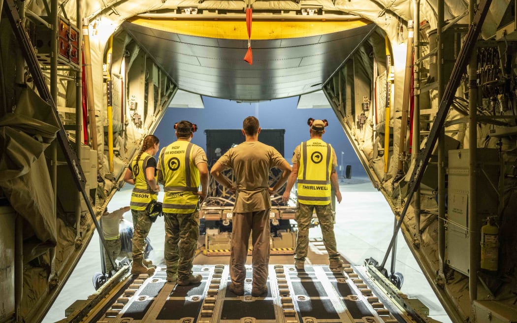 40SQN C-130J Hercules arrives in the Middle East as part of Op Kokako. RNZAF Air movement team unloads freight from the aircraft in the late hours of 25 June 2025.