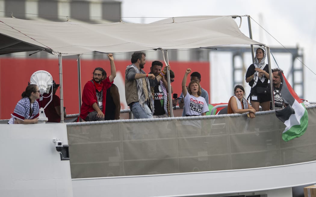 The Global Sumud Flotilla sets sail from Barcelona towards Gaza, in Barcelona, Spain, on August 31, 2025. Hundreds gather at Moll de la Fusta to bid farewell to the flotilla, with dozens of boats and thousands of supporters wearing kufiyas (Palestinian scarves) and waving flags.  (Photo by Lorena Sopena/NurPhoto) (Photo by Lorena Sopena / NurPhoto via AFP)