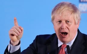 Britain's Prime Minister and leader of the Conservative Party, Boris Johnson speaks during a campaign event to celebrate the result of the General Election, in central London on December 13, 2019.