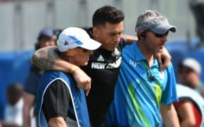 Sonny Bill Williams is helped from the field after an ankle injury.